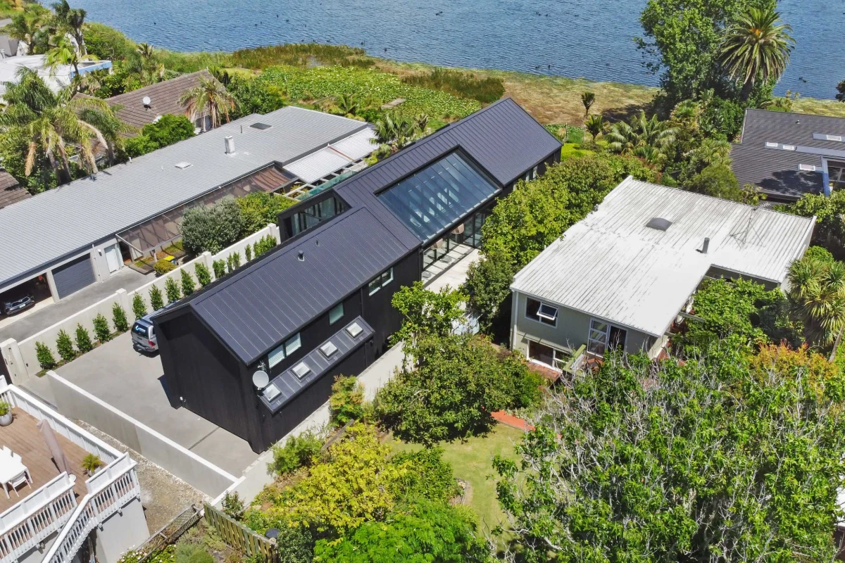 Aerial view of the Kitchener Road home and waterfront setting